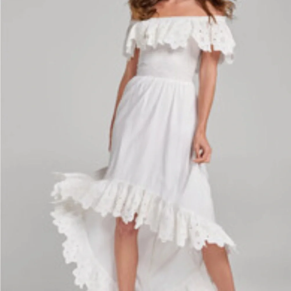 Smocked off shoulder white dress with high low hem. - Picture 2 of 2